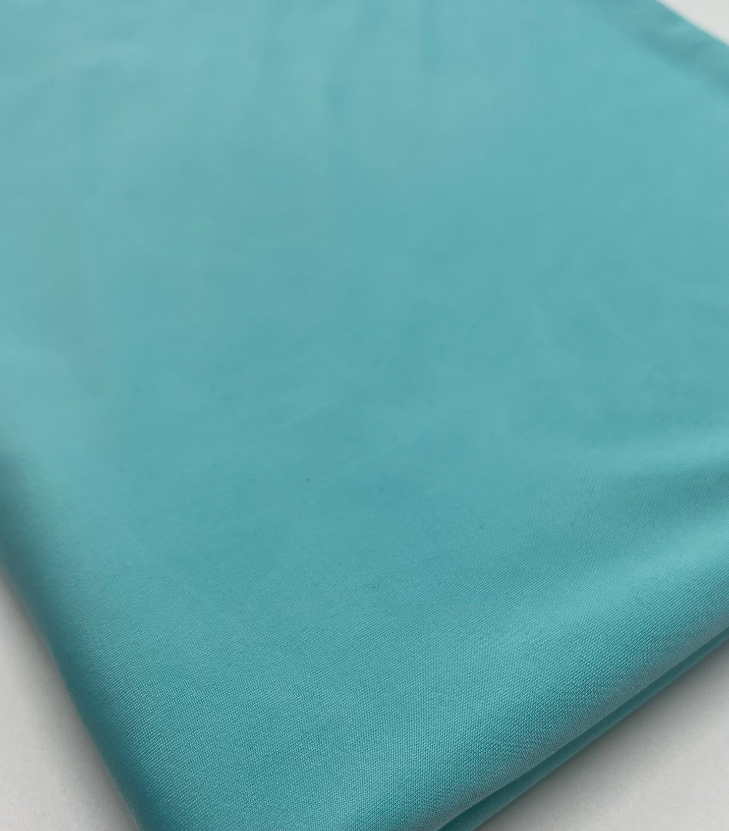 Aqua Blue Plain Shiny Soft Touch Slinky 4 Way Stretch Fabric