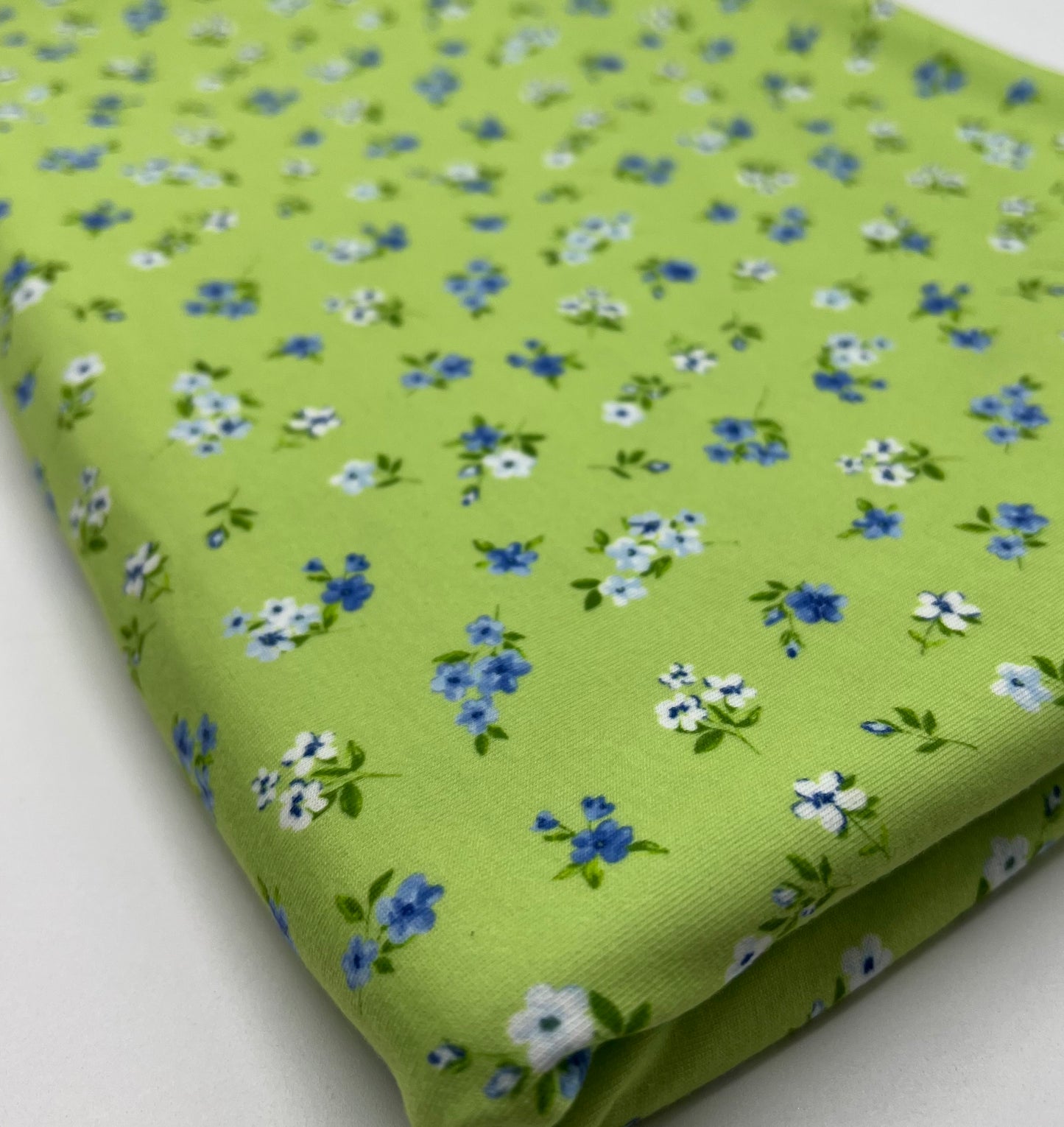 Bright Green Ditsy Floral Print Spun Poly Stretch Fabric