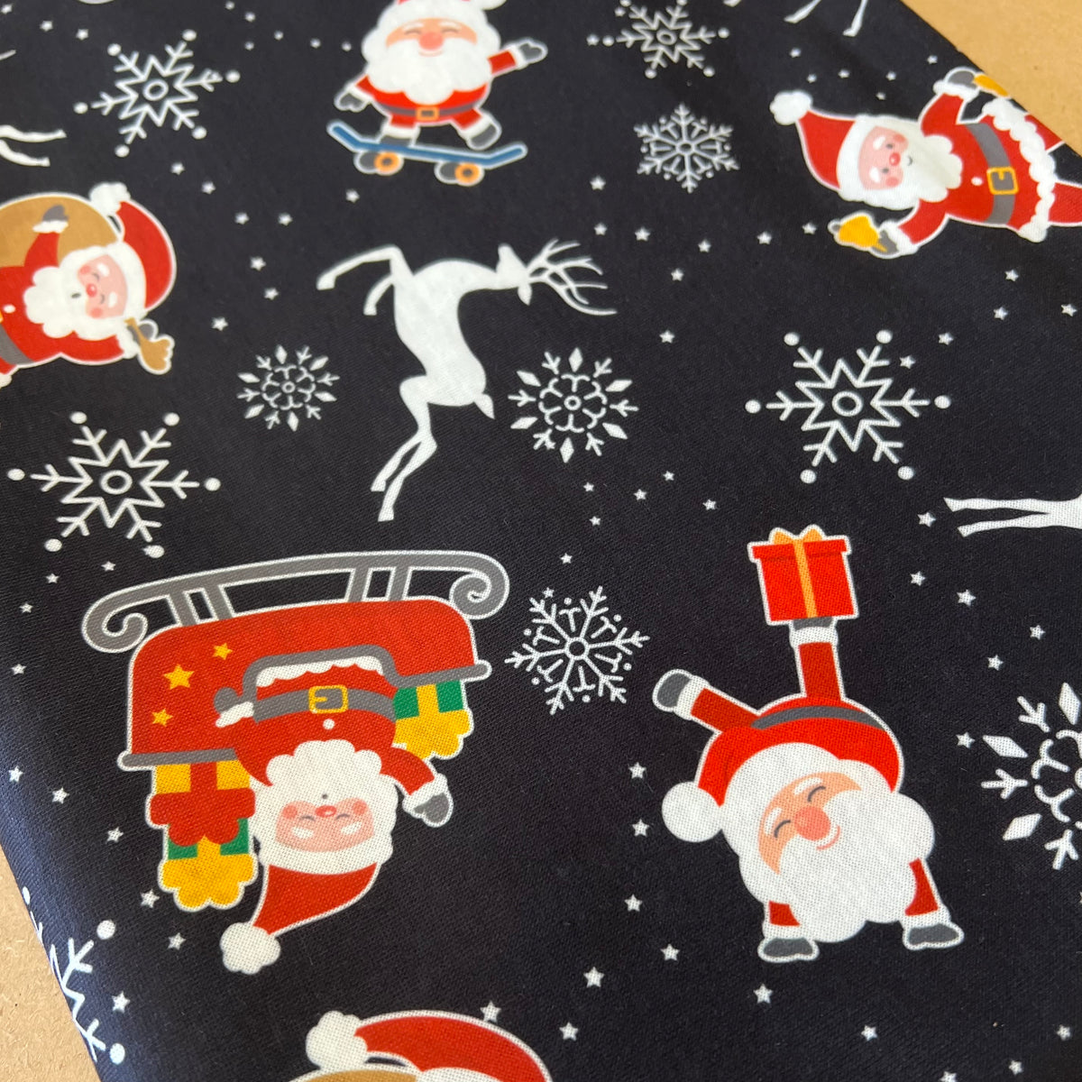 Santa Snowflake Print Soft Spun Poly Stretch Fabric