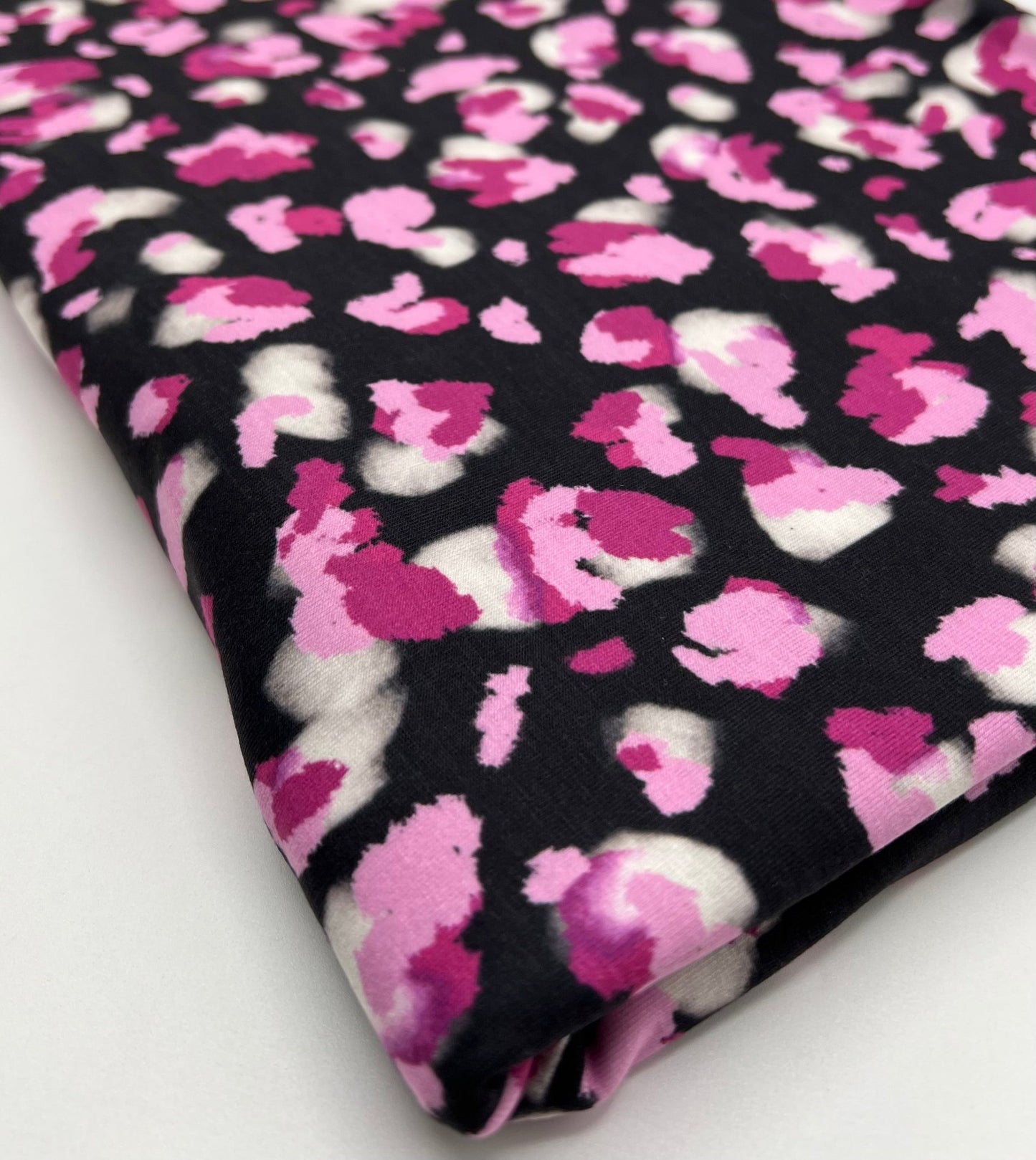 Black Pink Animal Print Viscose Elastane 4 Way Stretch Fabric - T9 Fabrics
