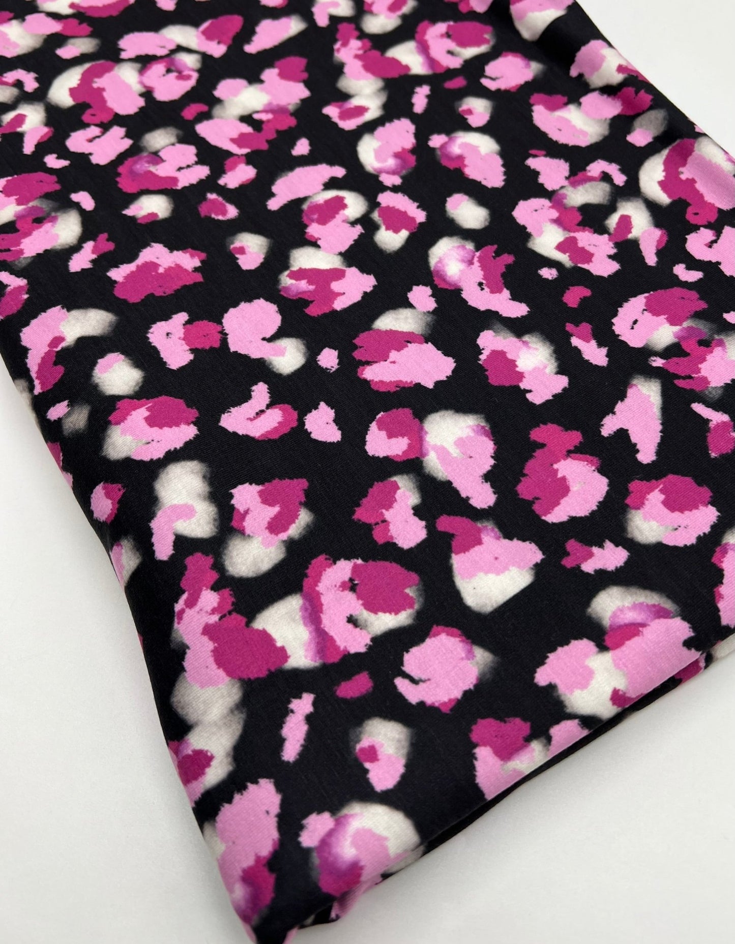 Black Pink Animal Print Viscose Elastane 4 Way Stretch Fabric - T9 Fabrics