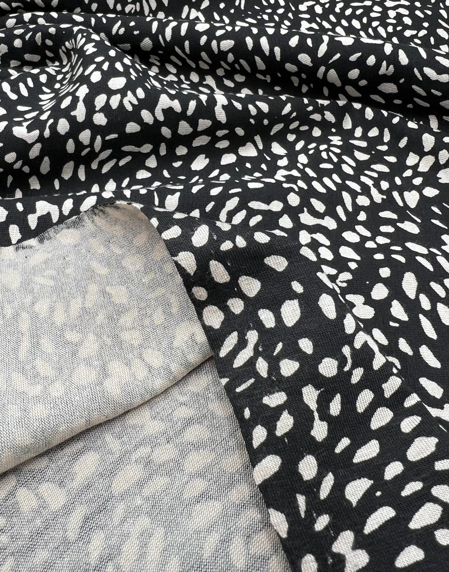 Black Stone Pebble Print Viscose Elastane 4 Way Stretch Fabric - T9 Fabrics