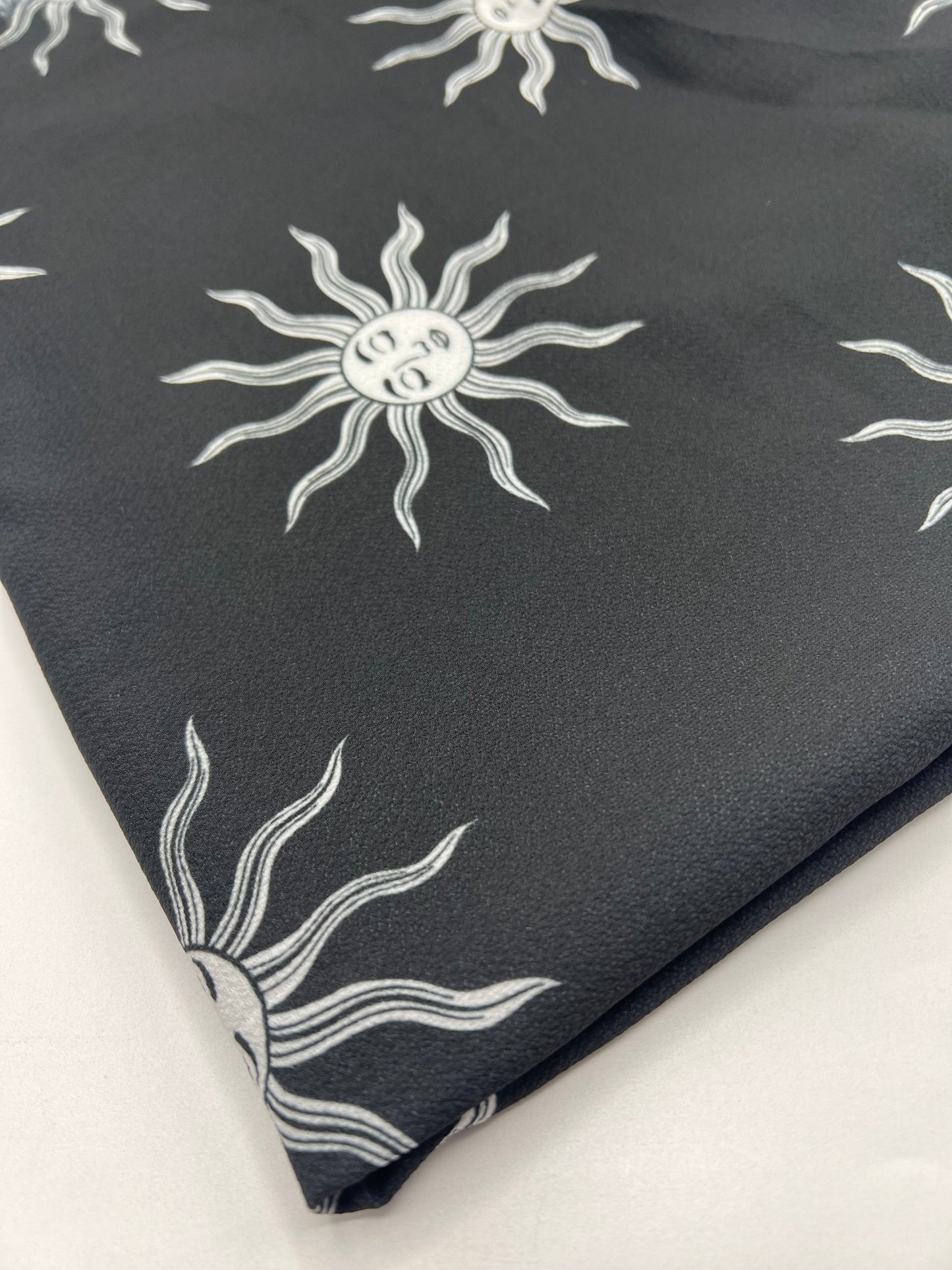 Black Sun Print Lightweight Bubble Crepe Fabric - T9 Fabrics