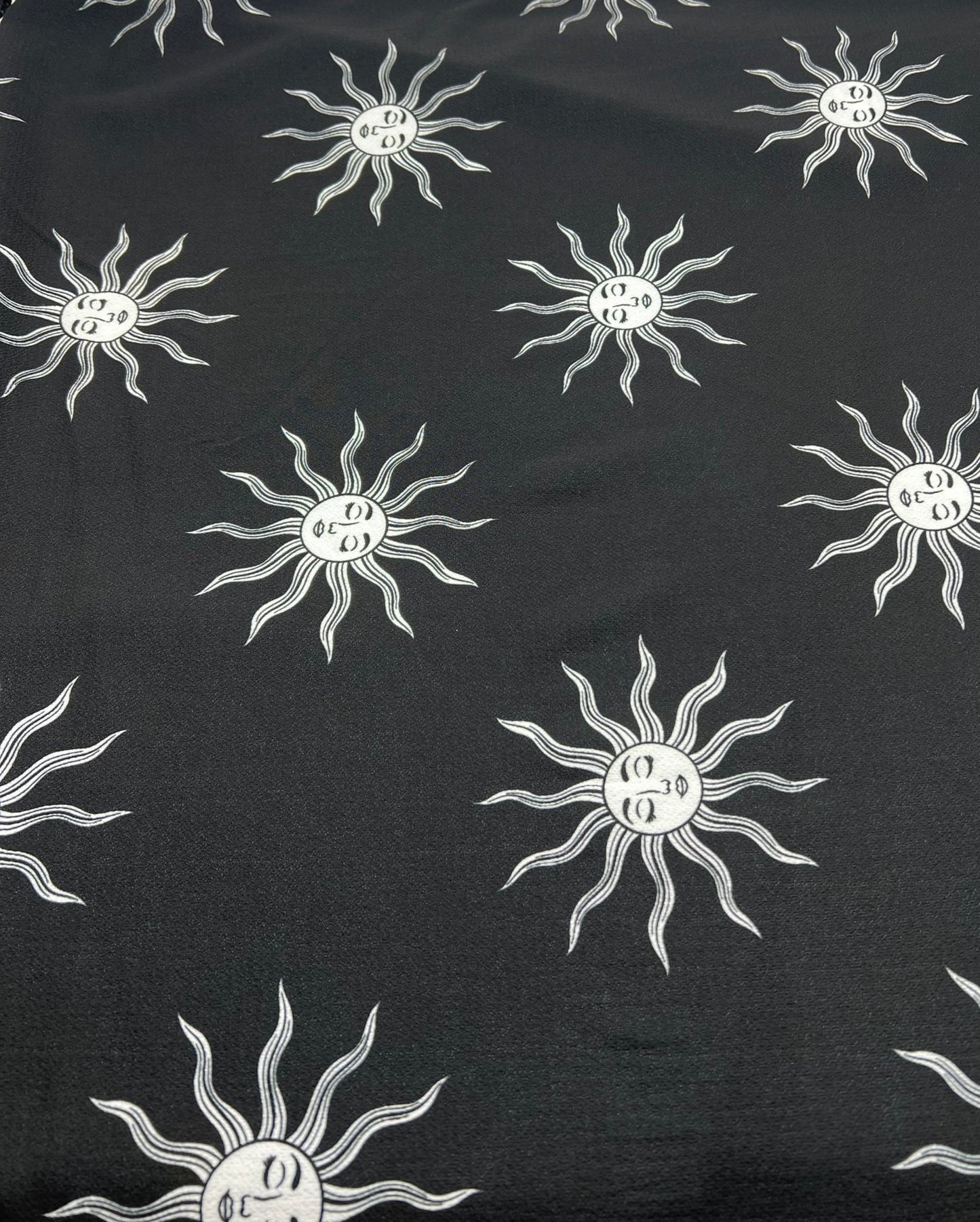 Black Sun Print Lightweight Bubble Crepe Fabric - T9 Fabrics