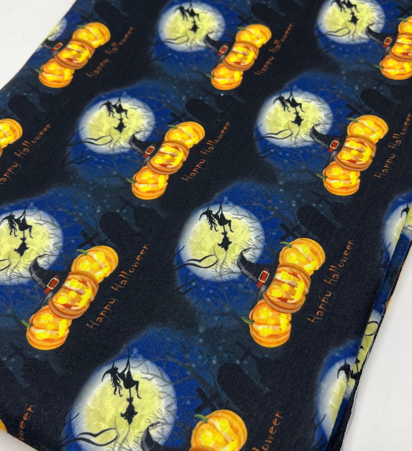 Blue Pumpkin Witch Print Spun Poly Stretch Fabric - T9 Fabrics