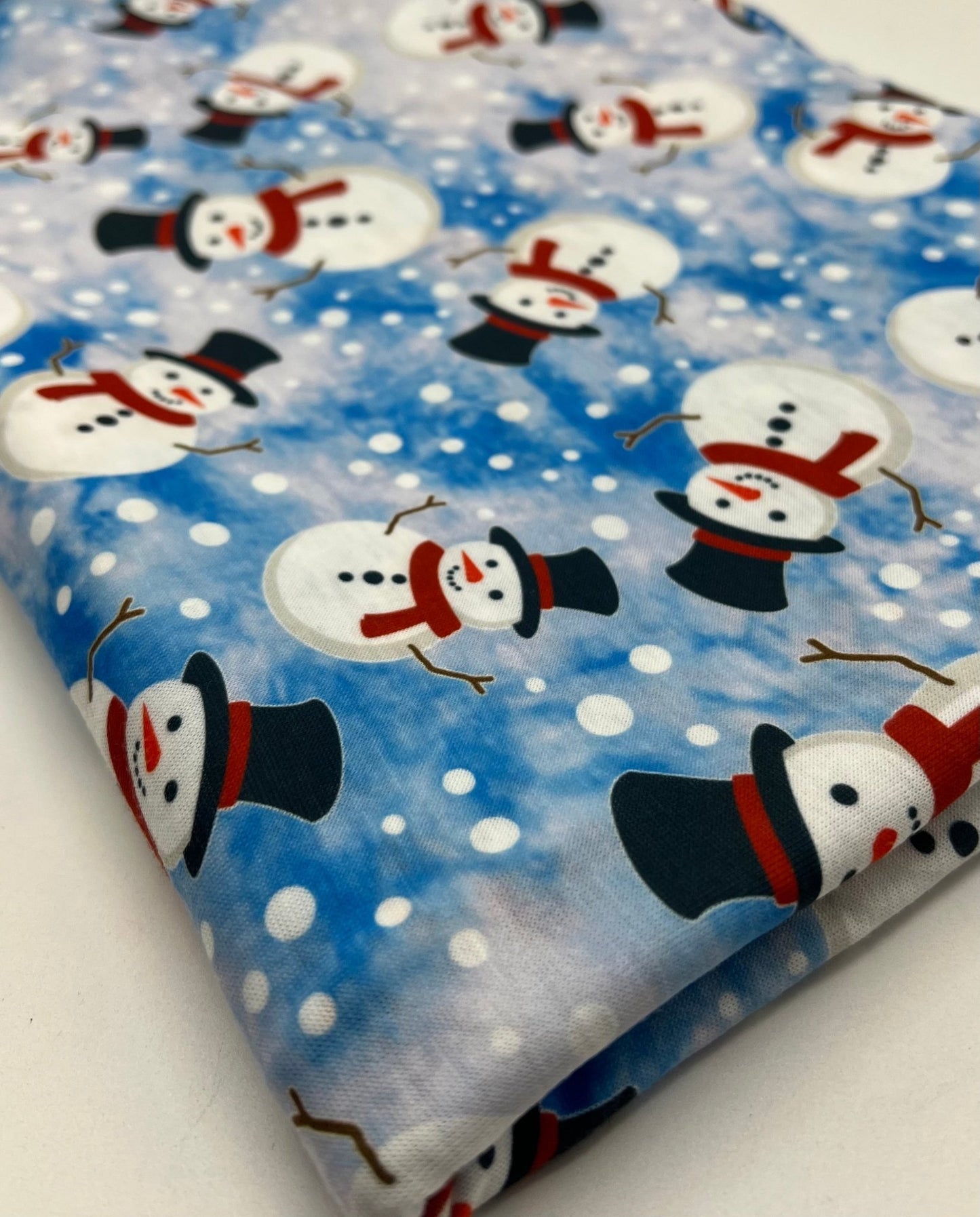 Blue Snow Snowman Print Soft Spun Poly Stretch Fabric - T9 Fabrics