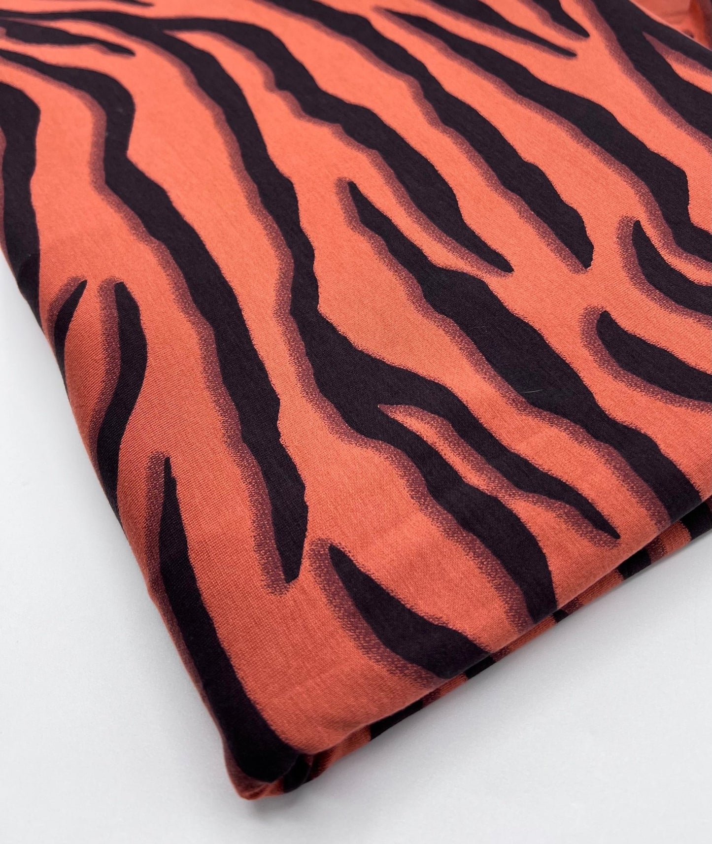 Brown Terracota Animal Print Viscose Elastane Fabric - T9 Fabrics