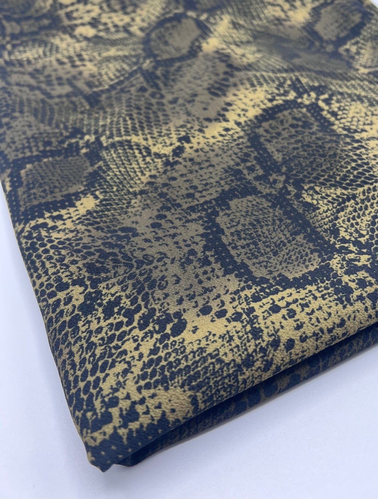 Dark Green Snake Print Light weight Bubble Crepe Fabric - T9 Fabrics