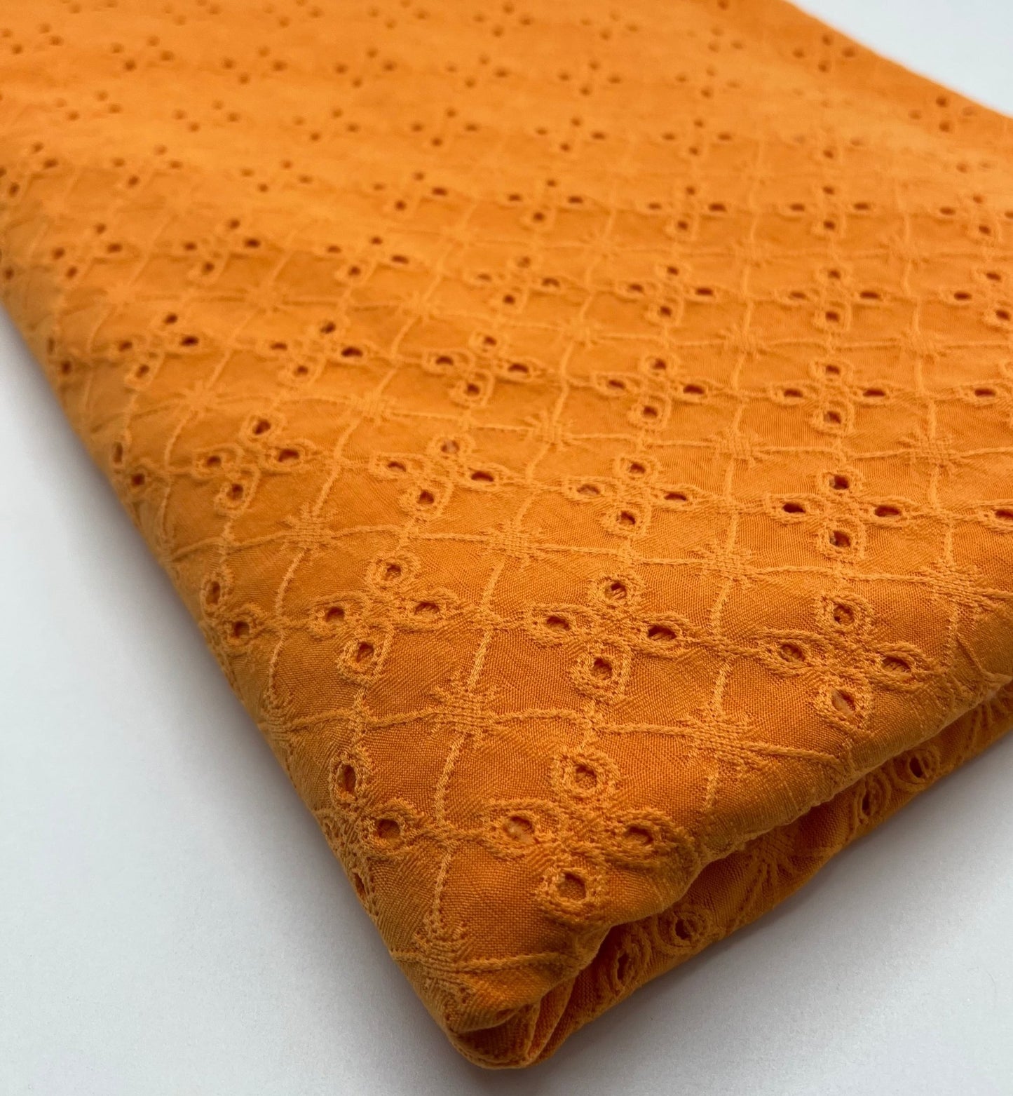 Orange Broderie Anglaise Stretch Fabric 4 Way Stretch Fabric - T9 Fabrics