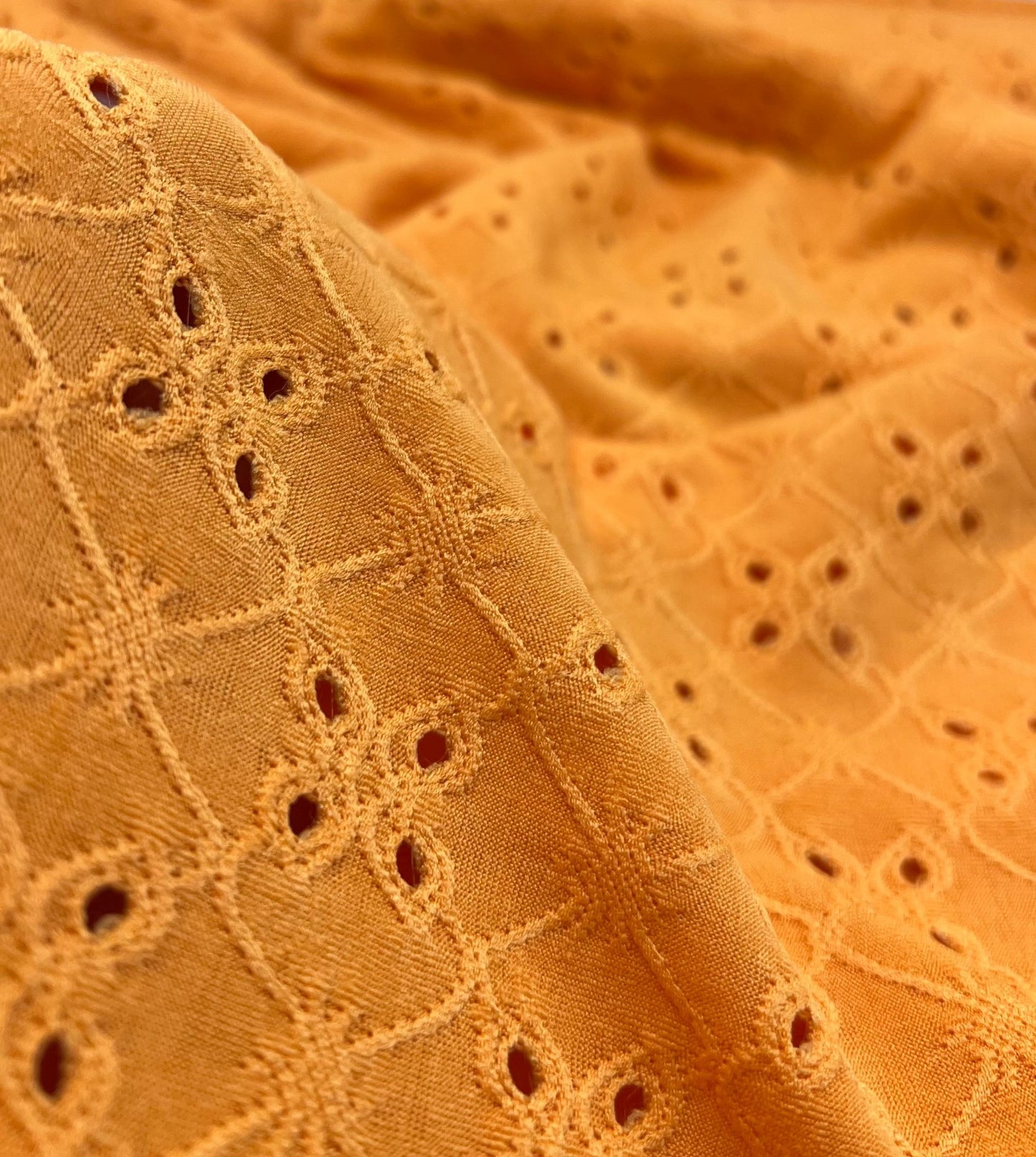 Orange Broderie Anglaise Stretch Fabric 4 Way Stretch Fabric - T9 Fabrics