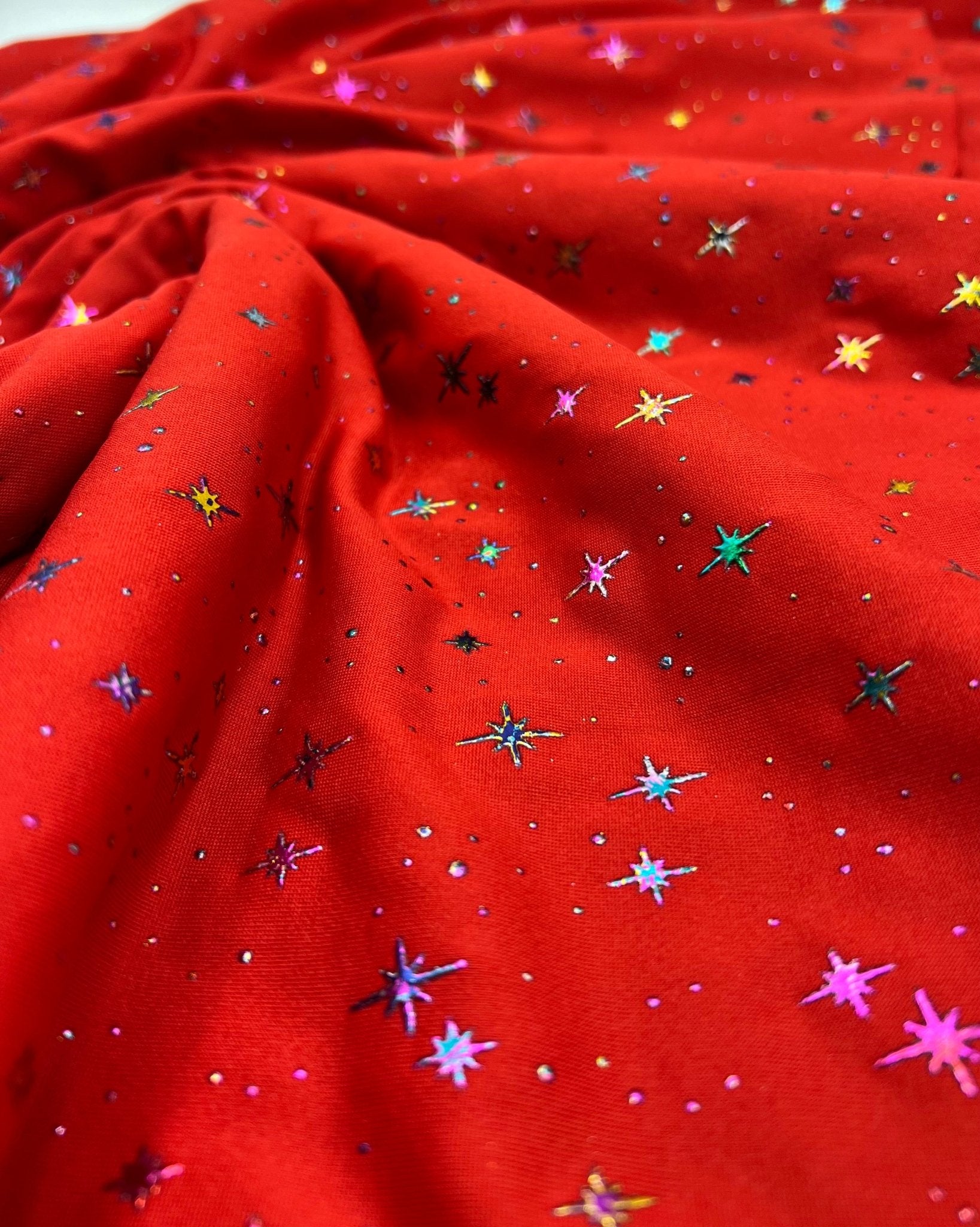 2 Metres Red Multi Star Printed spun poly Fabric - T9 Fabrics