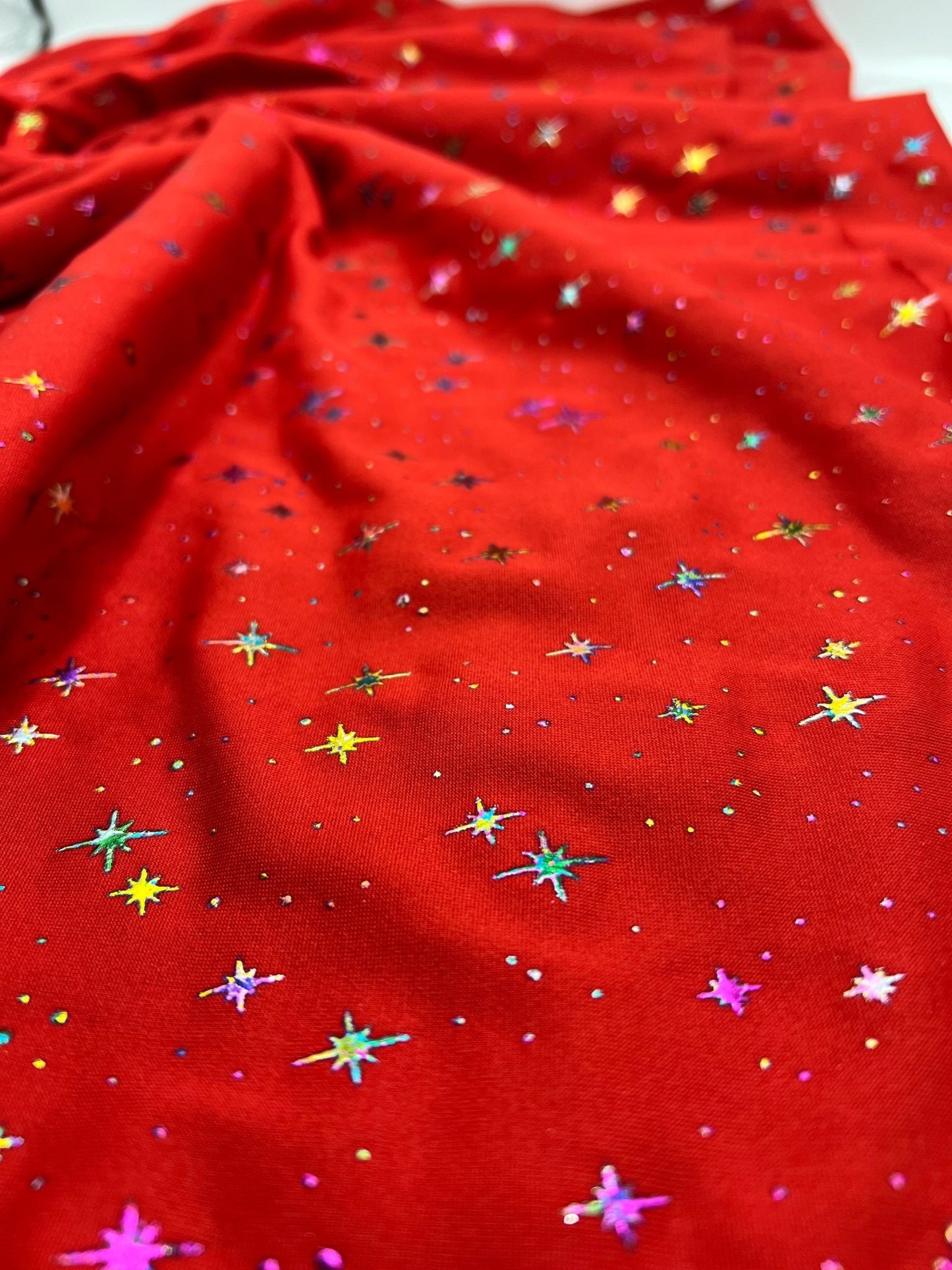 2 Metres Red Multi Star Printed spun poly Fabric - T9 Fabrics