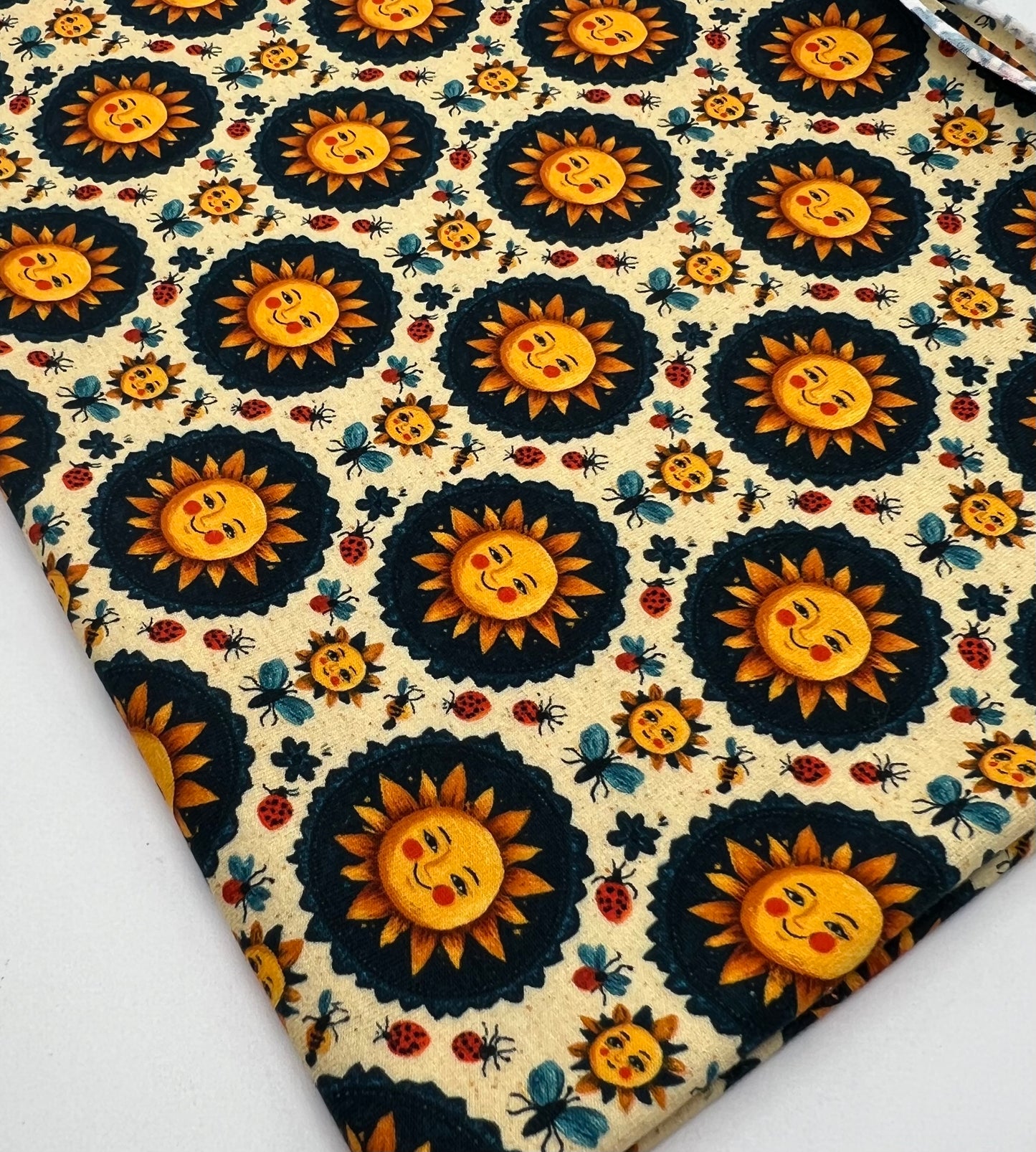 Folk Art Sun Faces Print Cotton Stretch Jersey 200 GSM 95/5 Lycra 4 Way Stretch
