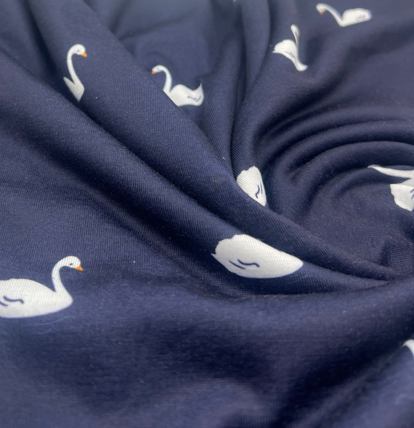 Navy Swan Print Spun Poly Stretch Fabric