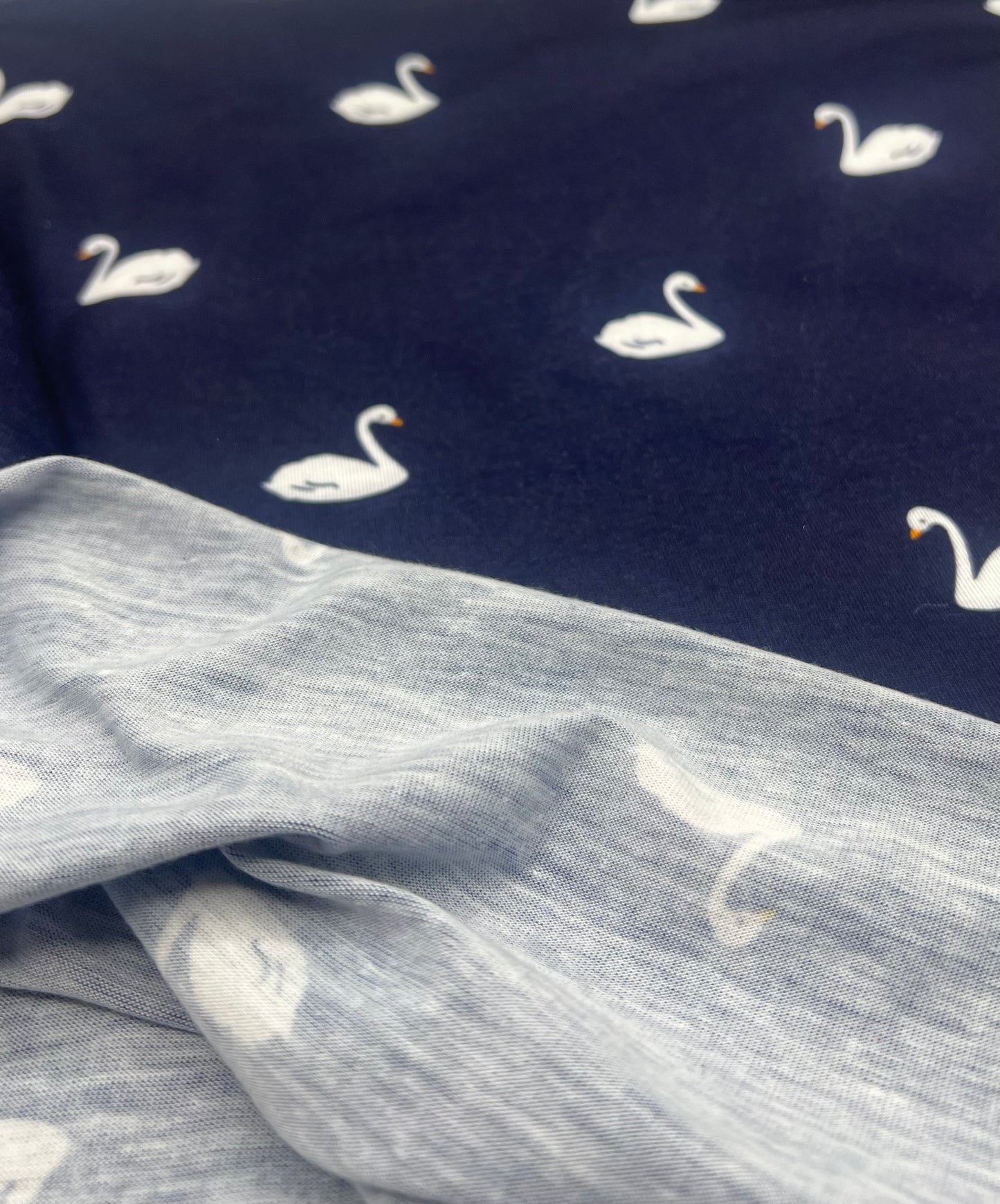 Navy Swan Print Spun Poly Stretch Fabric