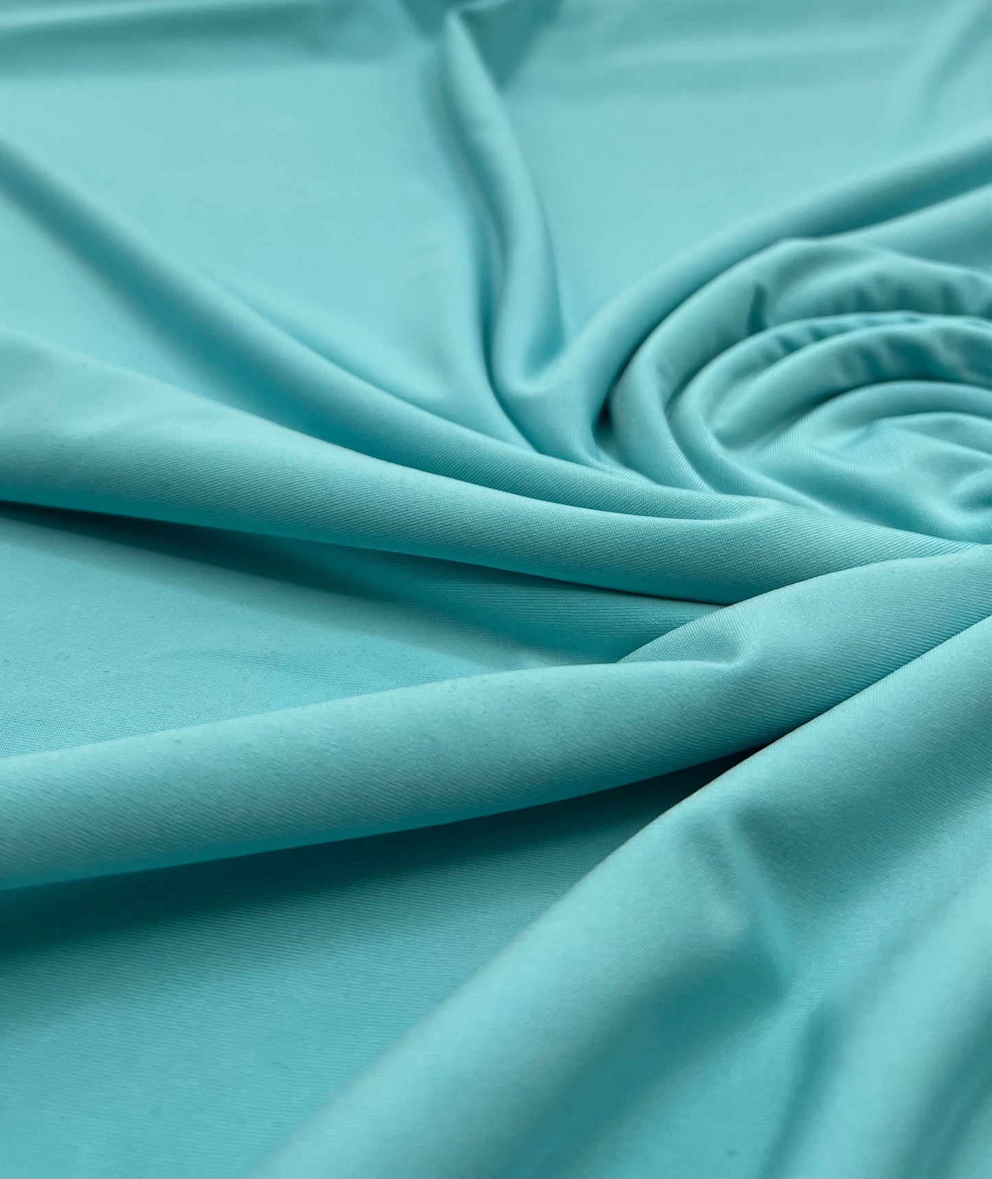 Aqua Blue Plain Shiny Soft Touch Slinky 4 Way Stretch Fabric
