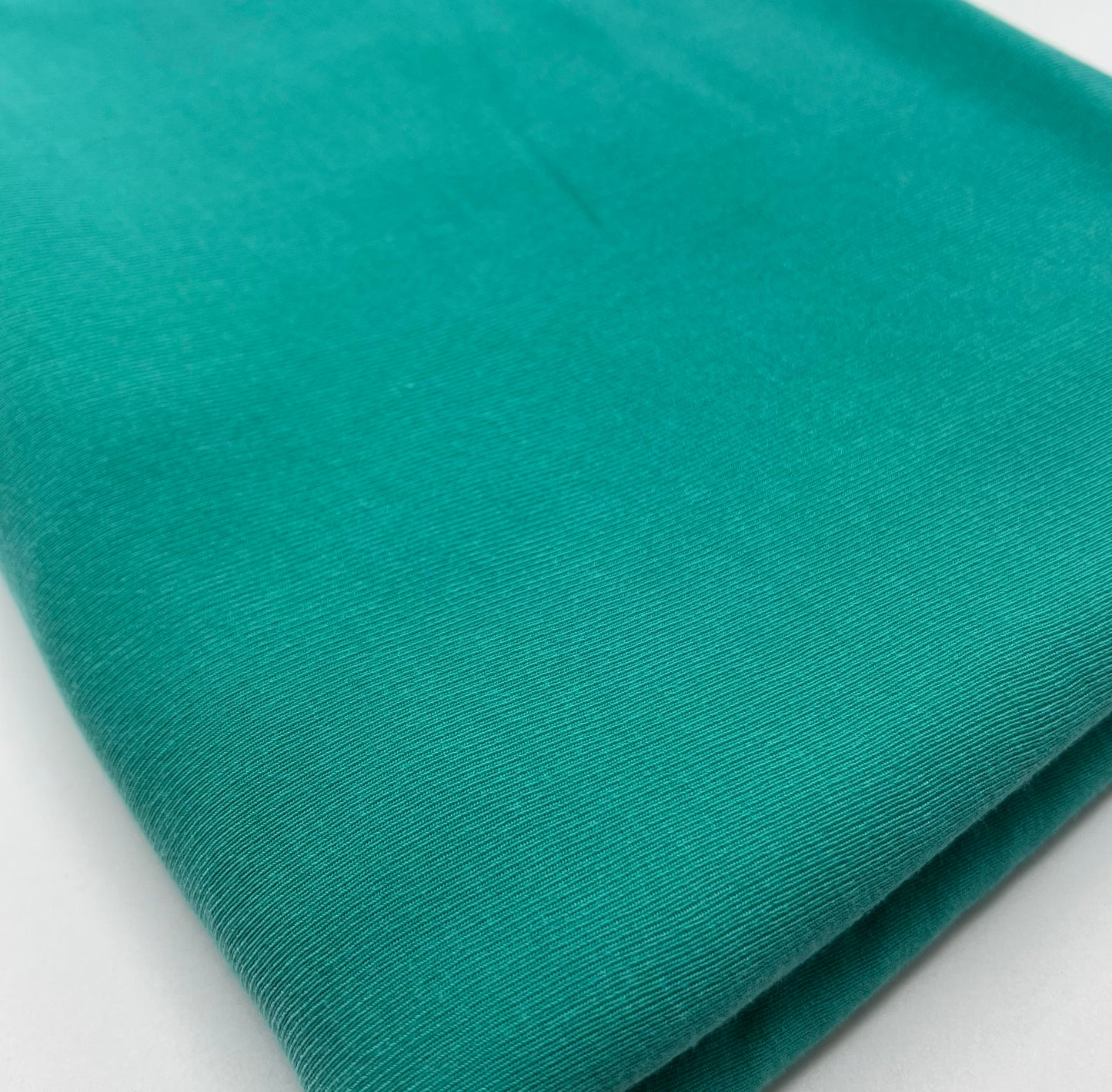 Jade Green Lightweight Melange Knit Stretch Fabric