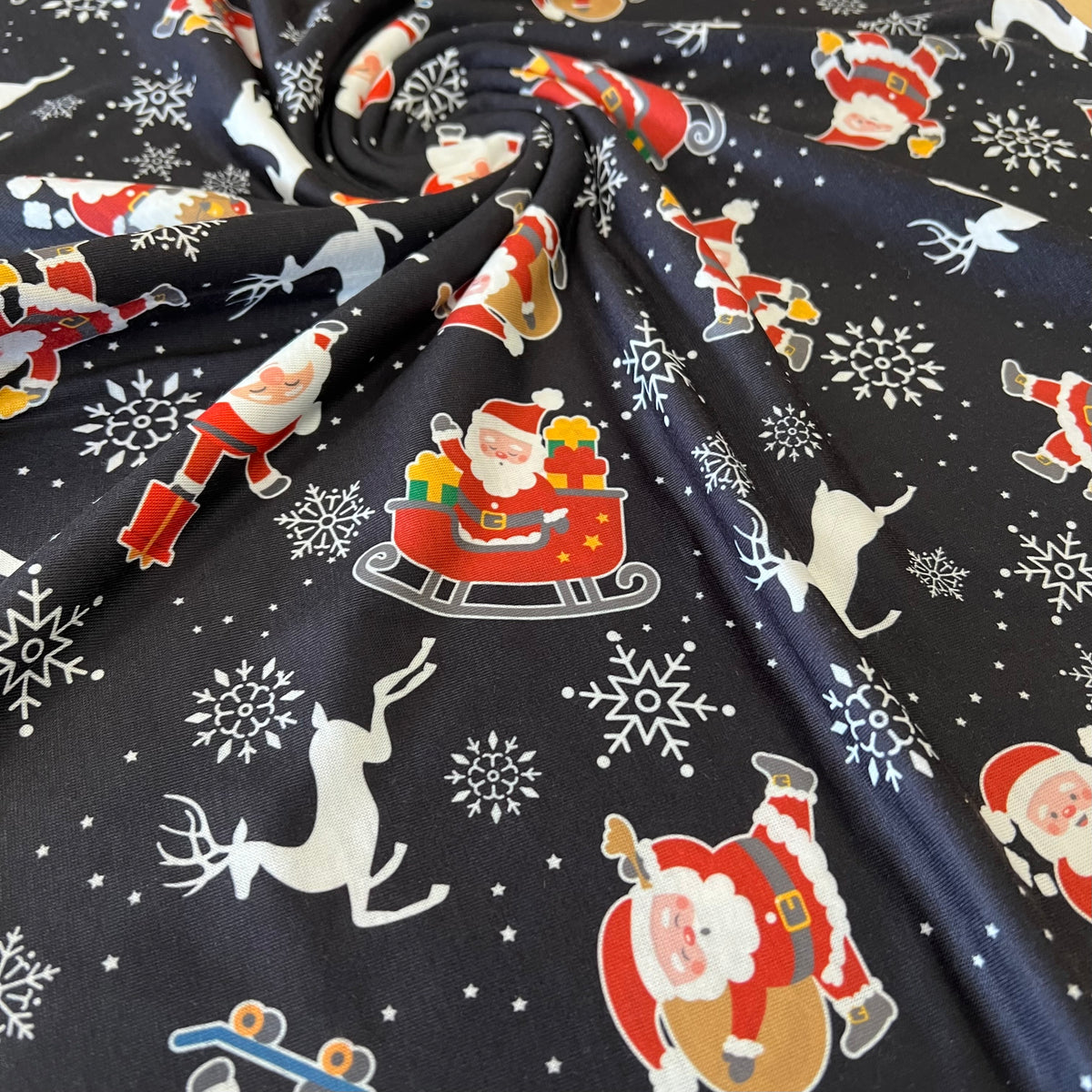 Santa Snowflake Print Soft Spun Poly Stretch Fabric