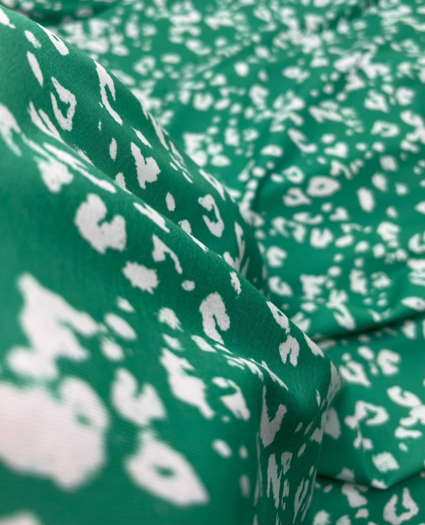 Green White Animal Mix Print Spun Poly Stretch Fabric