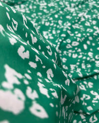 Green White Animal Mix Print Spun Poly Stretch Fabric