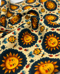 Folk Art Sun Faces Print Cotton Stretch Jersey 200 GSM 95/5 Lycra 4 Way Stretch