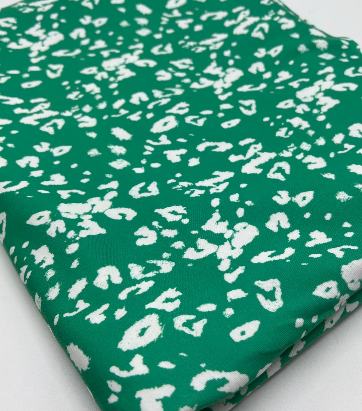 Green White Animal Mix Print Spun Poly Stretch Fabric