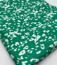 Green White Animal Mix Print Spun Poly Stretch Fabric