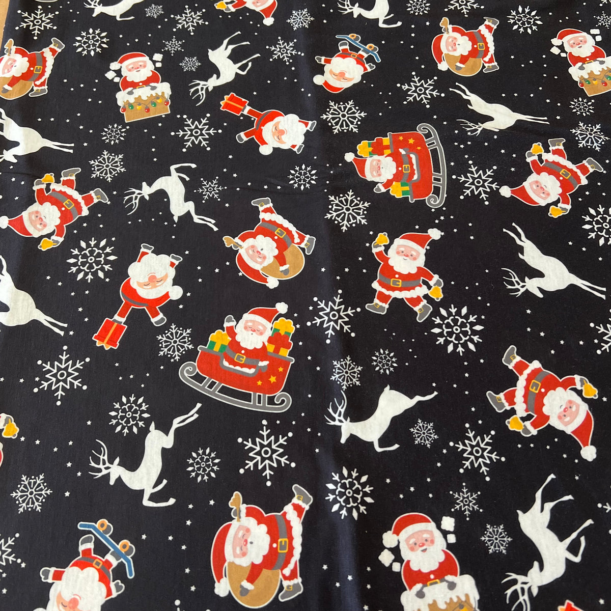 Santa Snowflake Print Soft Spun Poly Stretch Fabric