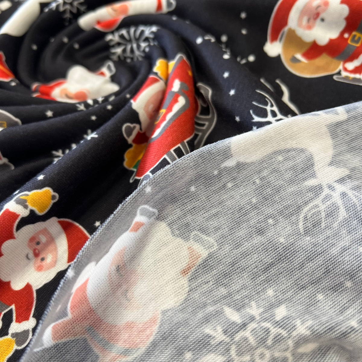 Santa Snowflake Print Soft Spun Poly Stretch Fabric