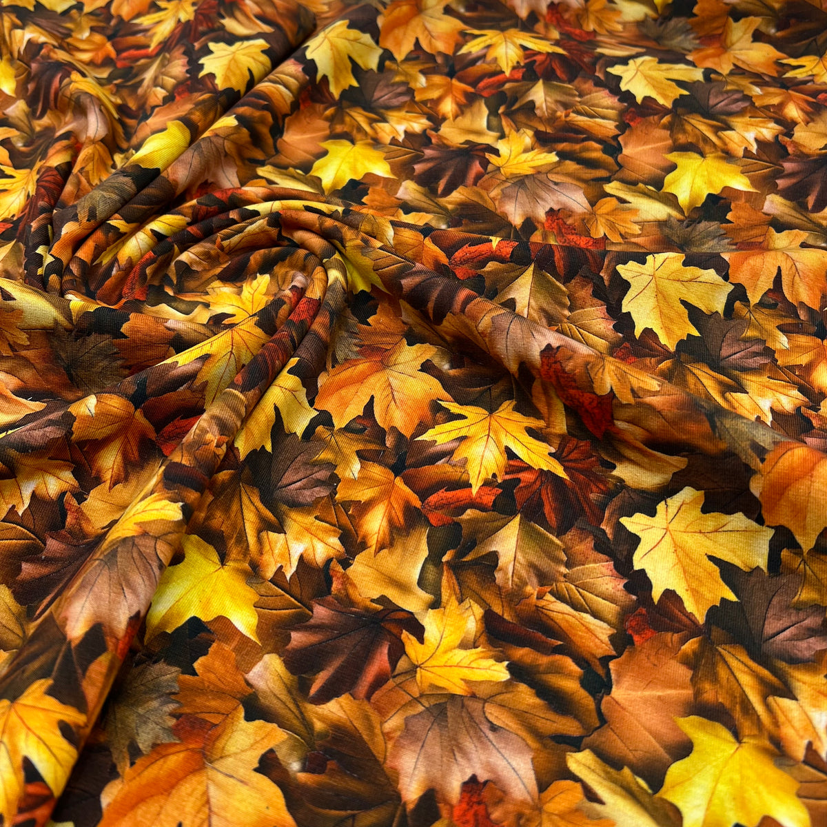 Brown Leaves Print Cotton Jersey 200 GSM 95/5 Lycra 4 Way Stretch