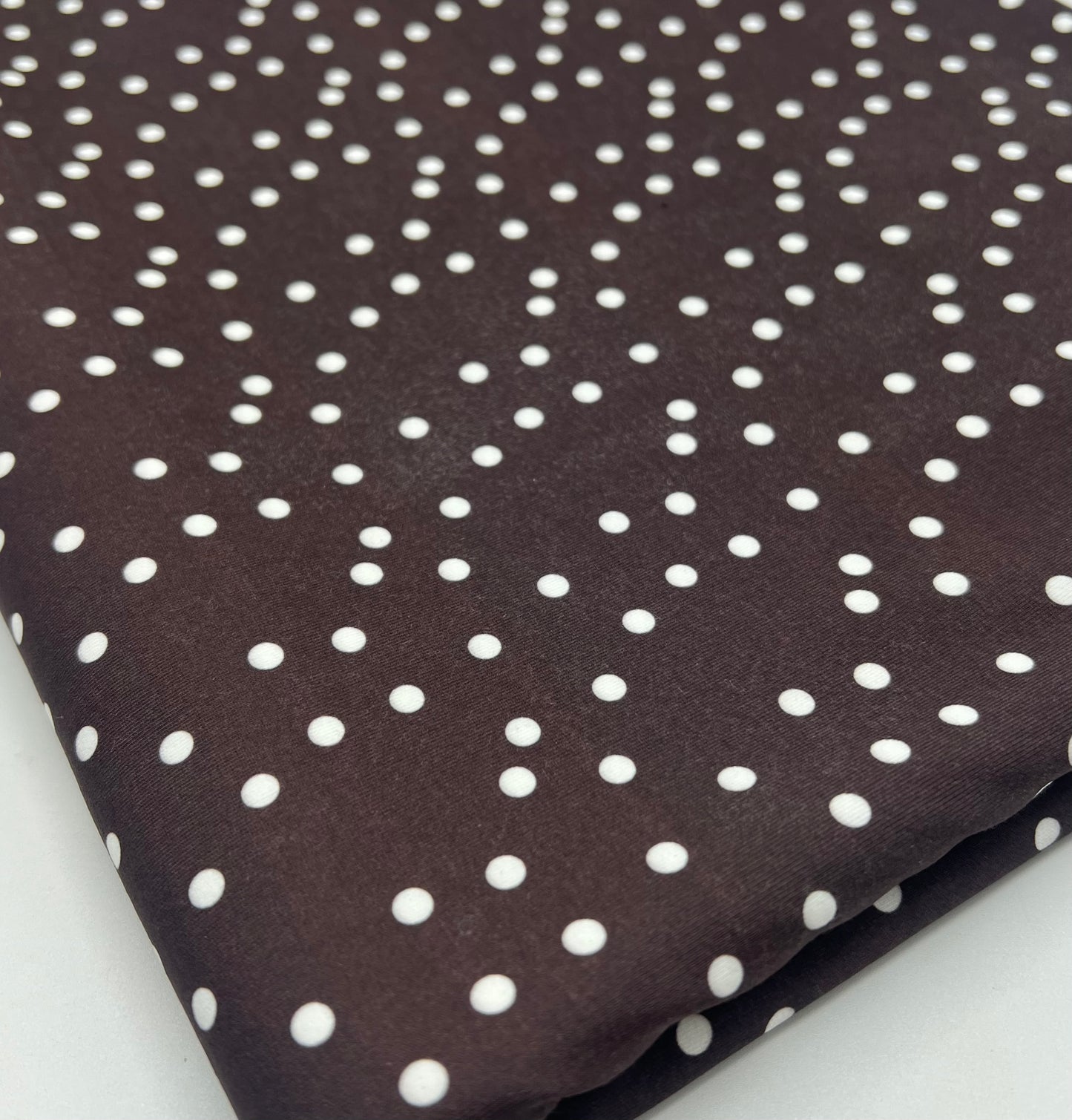 Brown Polka Stretch Jersey 220GSM 4 Way Stretch Fabric