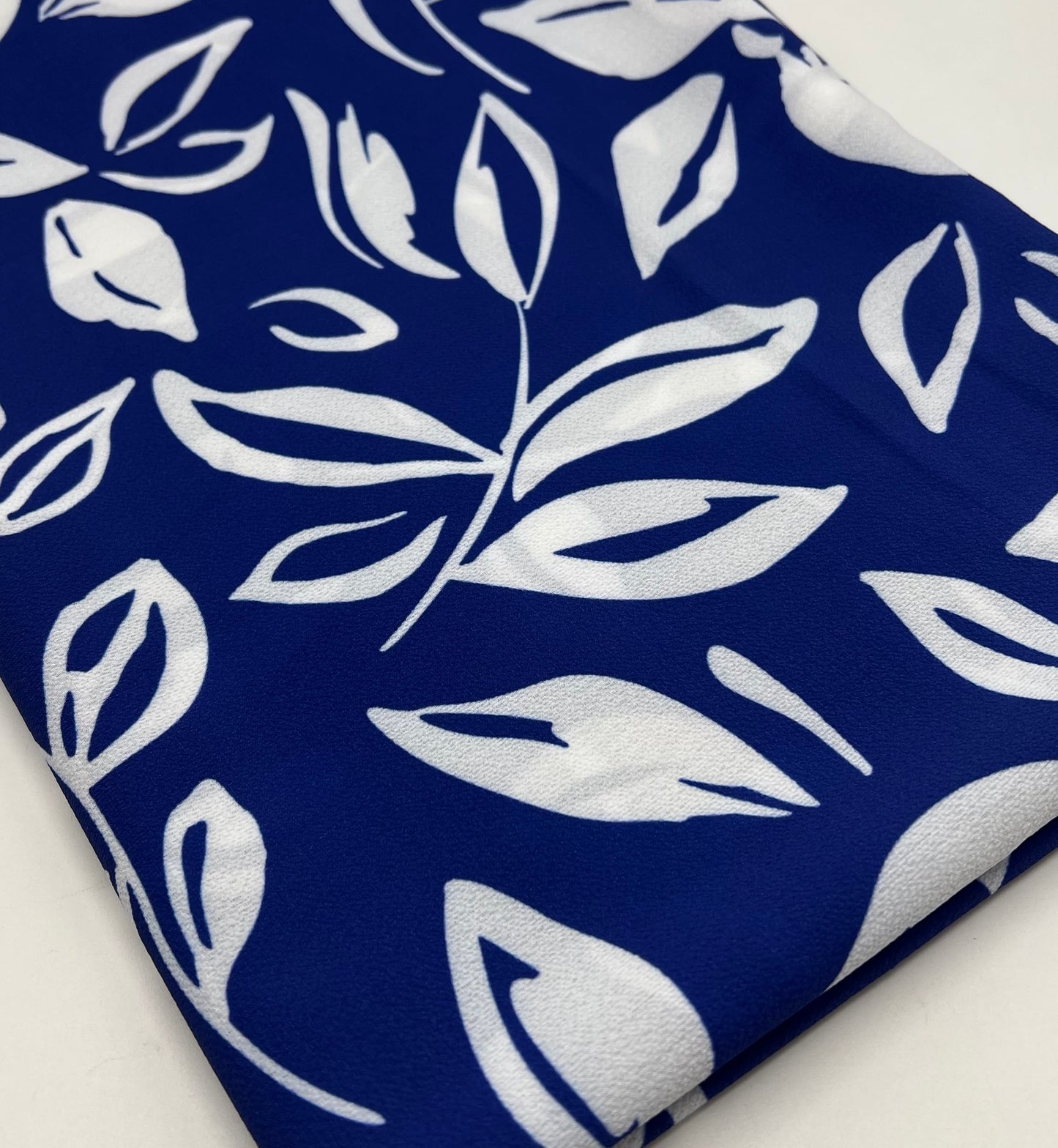 Blue Leaf Print Lightweight Bubble Crepe Fabric