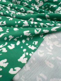 Green White Animal Mix Print Spun Poly Stretch Fabric
