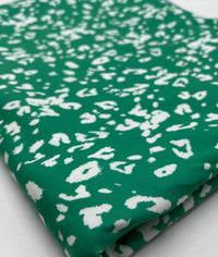 Green White Animal Mix Print Spun Poly Stretch Fabric