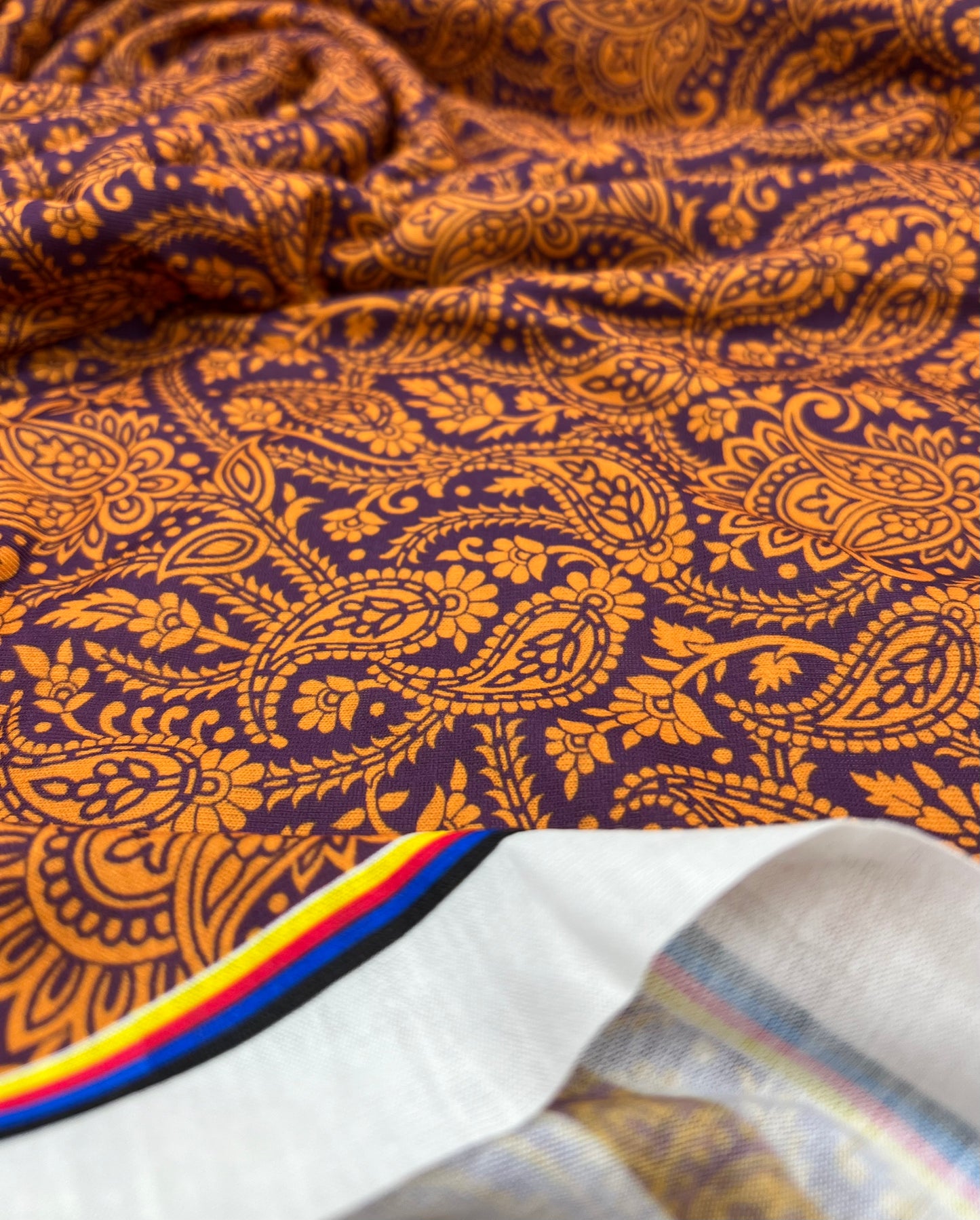 Gold & Purple Paisley Print Spun Poly Stretch Fabric