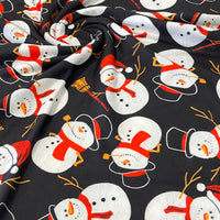 Snowman Broom Print Soft Spun Poly Stretch Fabric