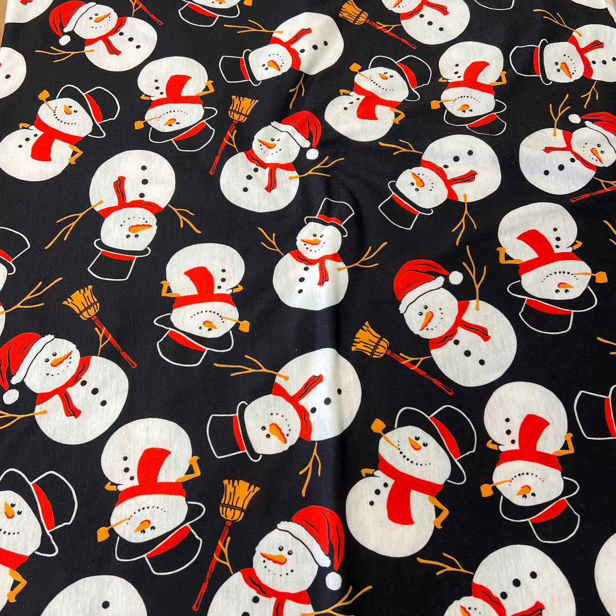 Snowman Broom Print Soft Spun Poly Stretch Fabric
