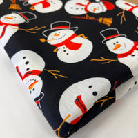 Snowman Broom Print Soft Spun Poly Stretch Fabric