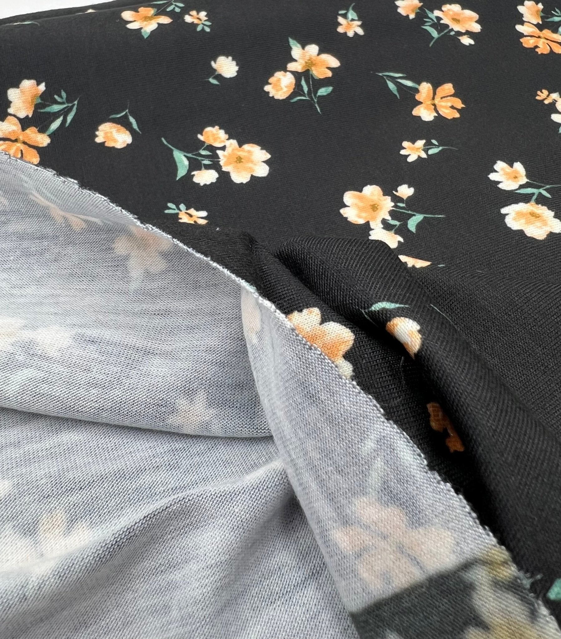 Black Orange Ditsy Floral Print Soft Spun Poly Stretch Fabric - T9 Fabrics