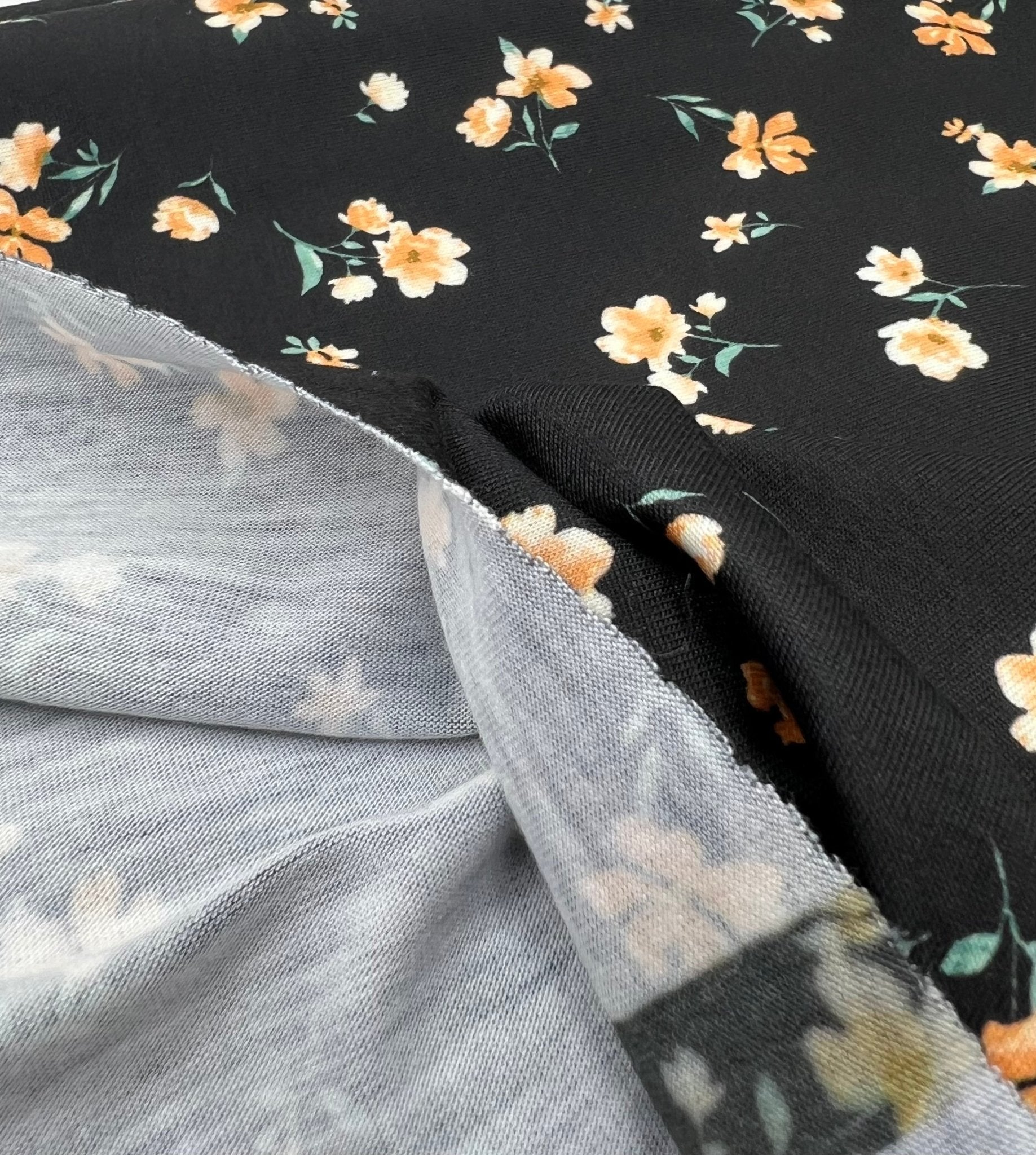Black Orange Ditsy Floral Print Soft Spun Poly Stretch Fabric - T9 Fabrics