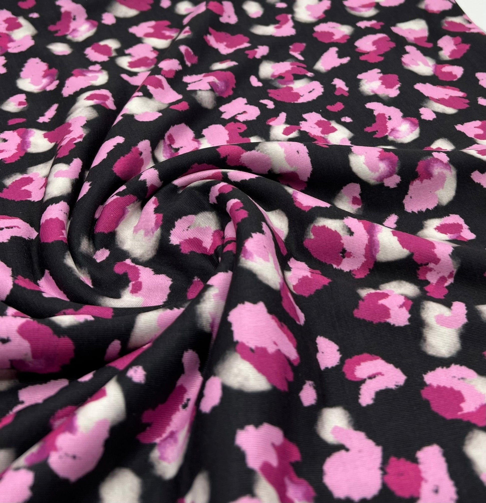 Black Pink Animal Print Viscose Elastane 4 Way Stretch Fabric - T9 Fabrics