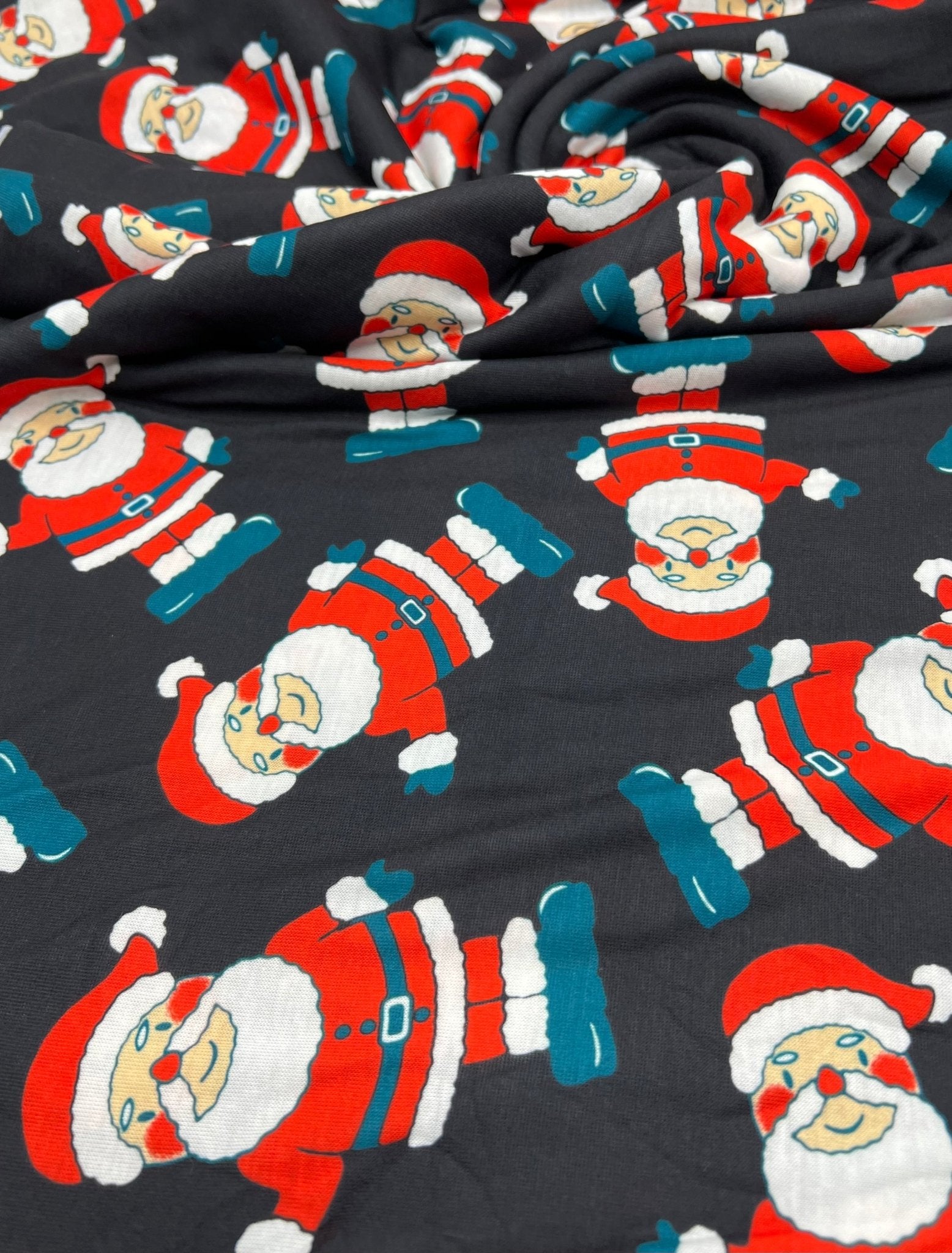 Black Rosy Cheek Santa Print Soft Spun Poly Stretch Fabric - T9 Fabrics