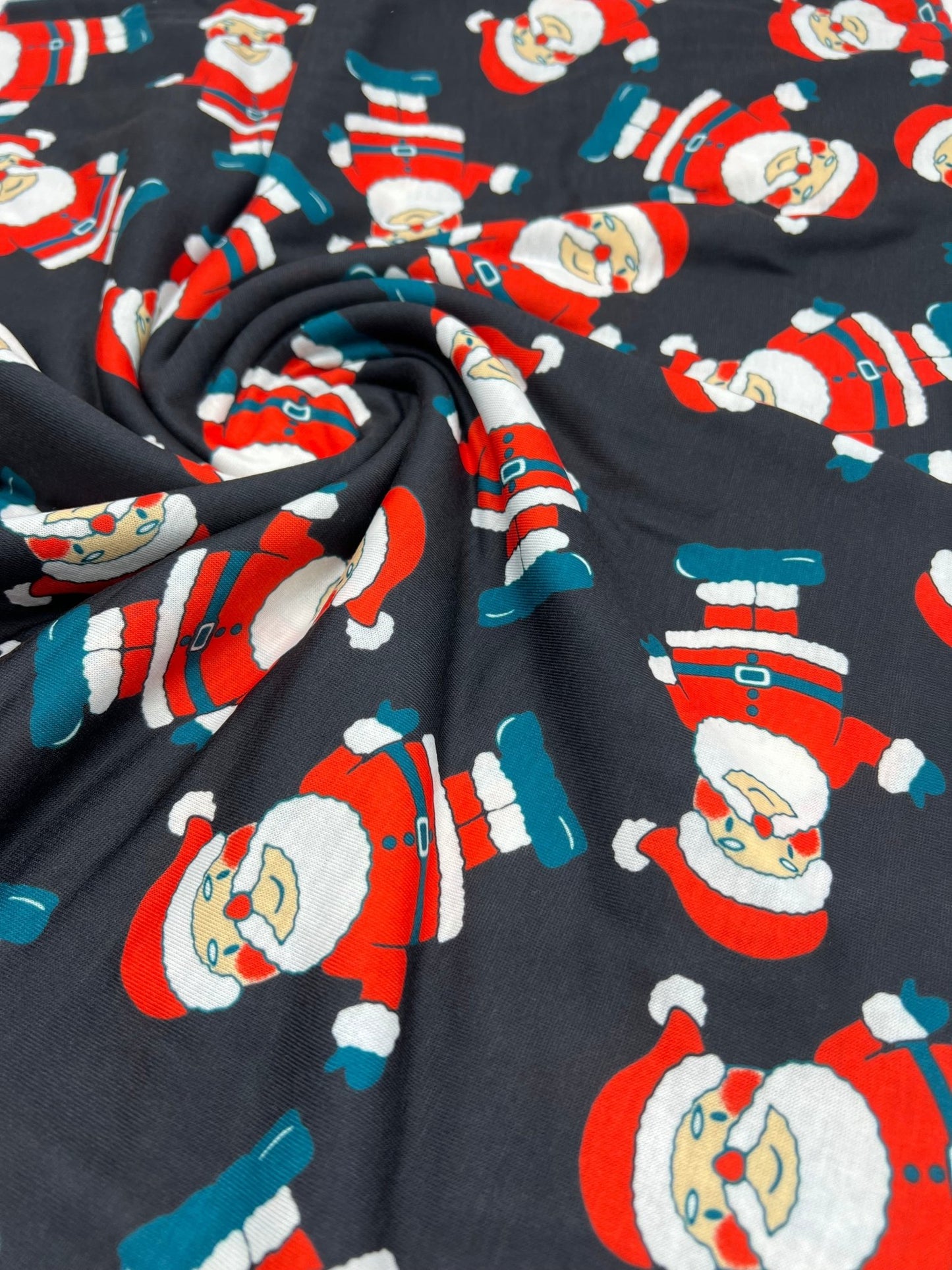 Black Rosy Cheek Santa Print Soft Spun Poly Stretch Fabric - T9 Fabrics