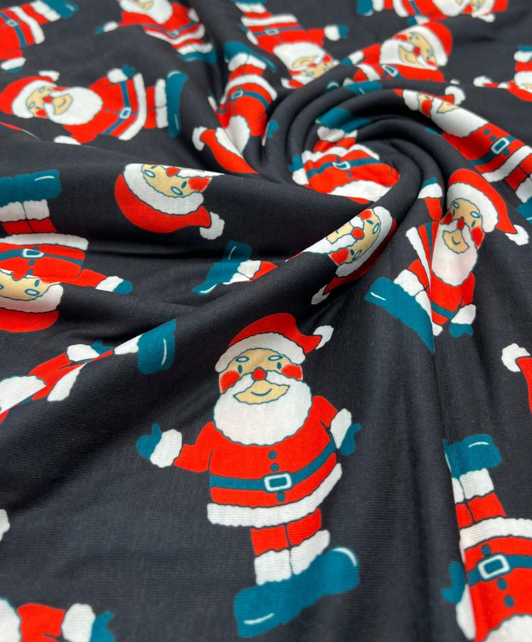 Black Rosy Cheek Santa Print Soft Spun Poly Stretch Fabric - T9 Fabrics