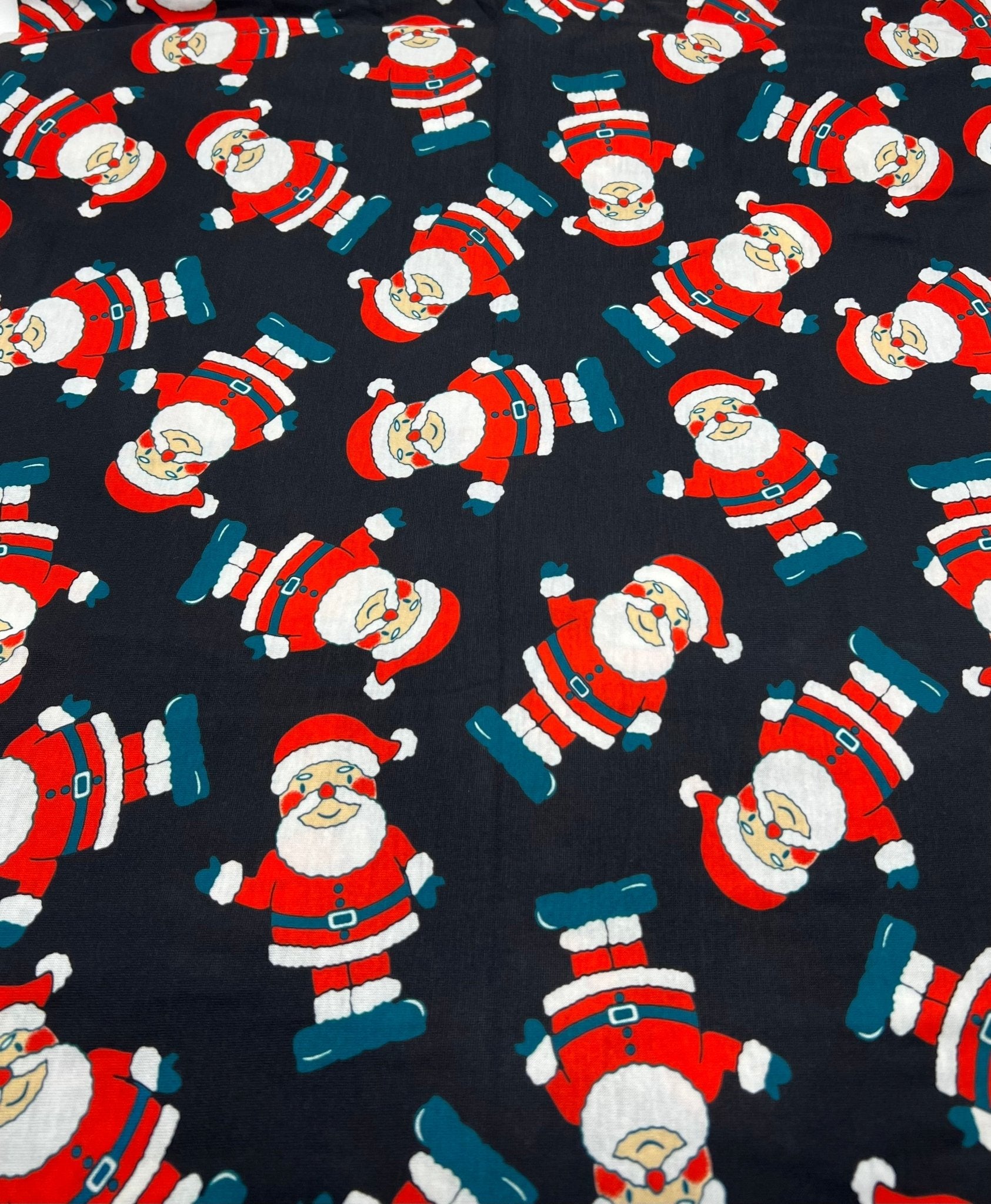 Black Rosy Cheek Santa Print Soft Spun Poly Stretch Fabric - T9 Fabrics