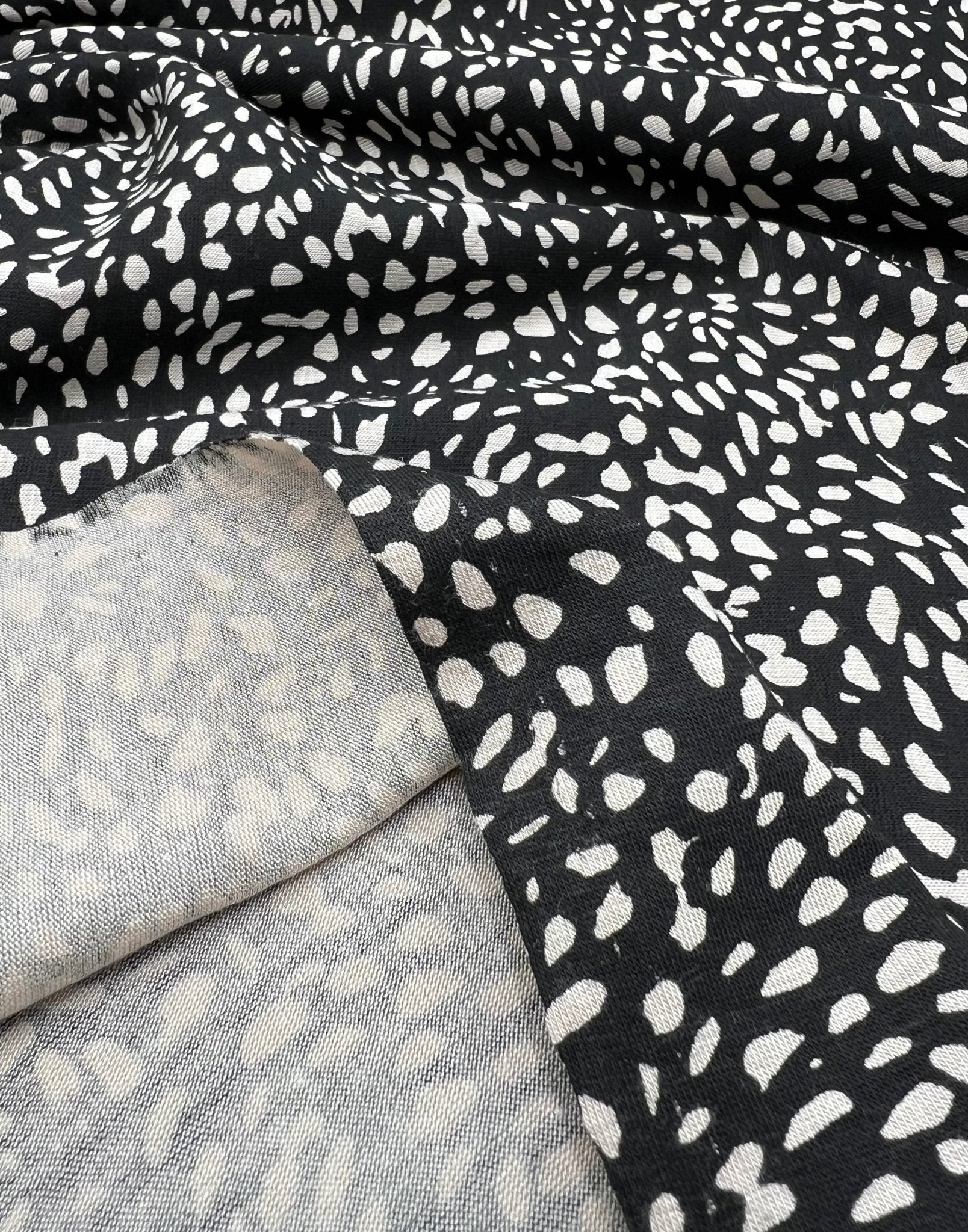 Black Stone Pebble Print Viscose Elastane 4 Way Stretch Fabric - T9 Fabrics