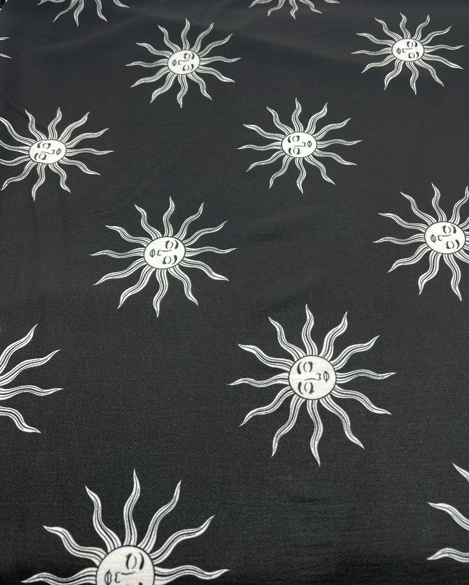 Black Sun Print Lightweight Bubble Crepe Fabric - T9 Fabrics