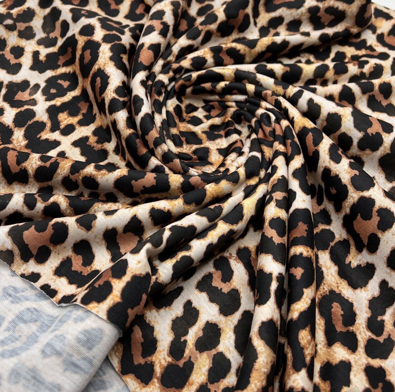 Black Tan Animal Print Spun Poly Stretch Fabric - T9 Fabrics