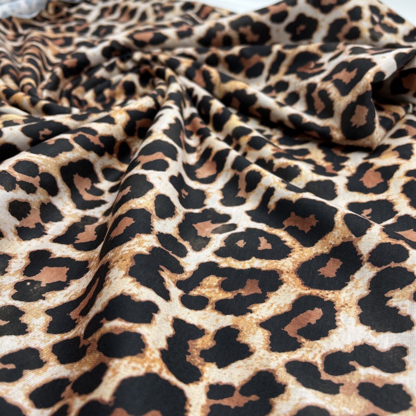 Black Tan Animal Print Spun Poly Stretch Fabric - T9 Fabrics