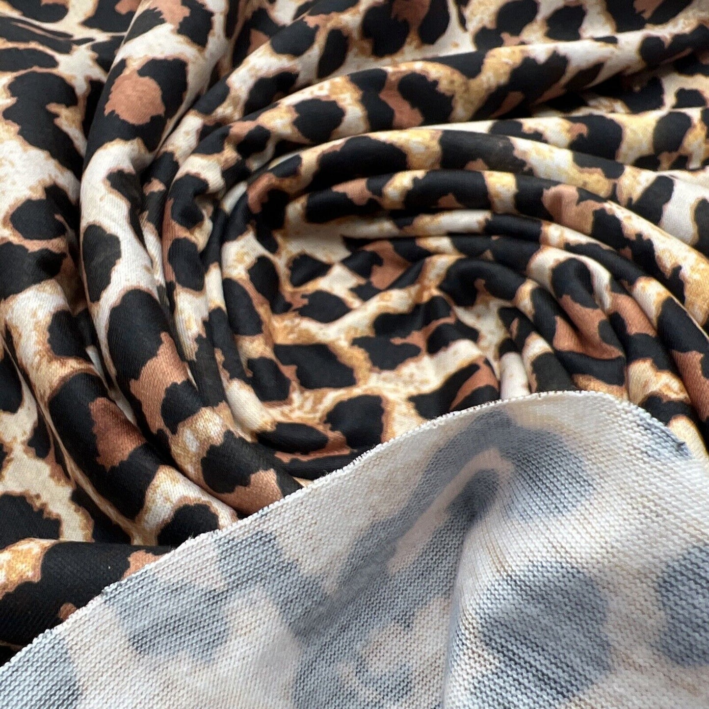 Black Tan Animal Print Spun Poly Stretch Fabric - T9 Fabrics